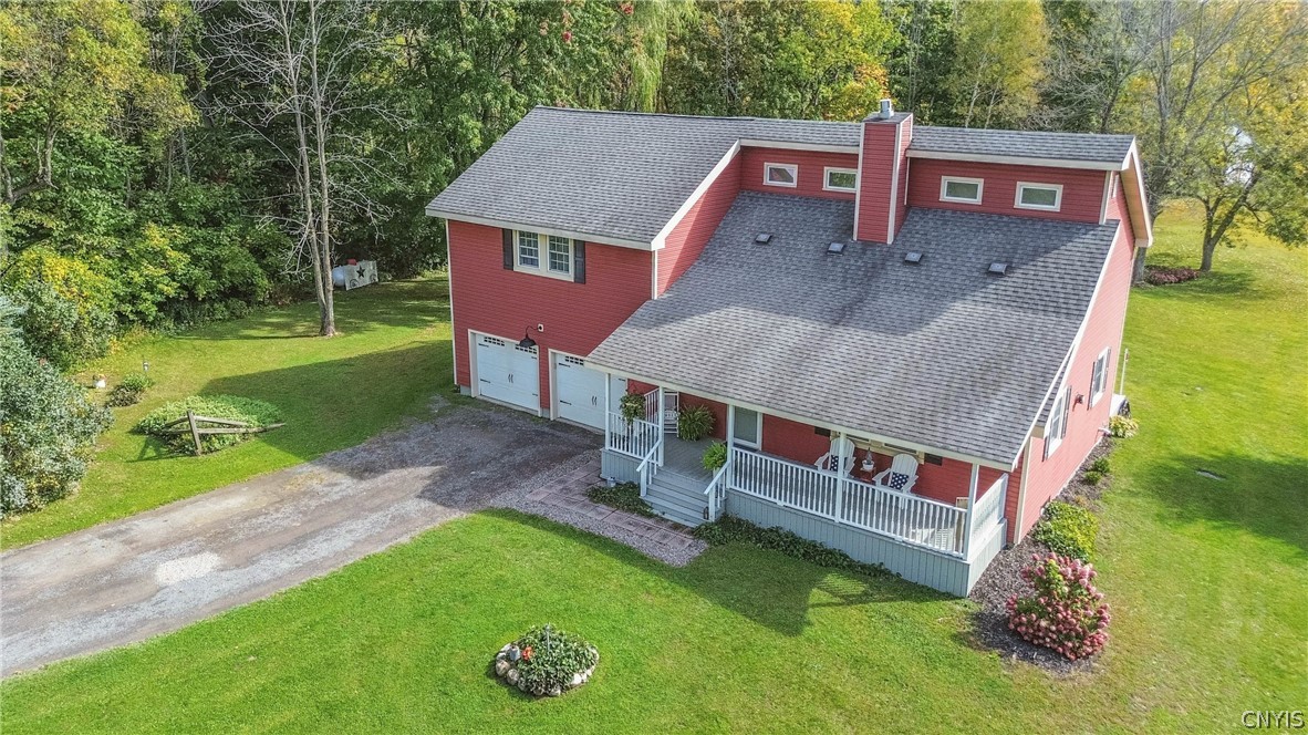 15384 Fuller Road Adams, NY 13606 - Photo 15 of 50 A spacious front porch welcomes guests to this charming multi-level country home.