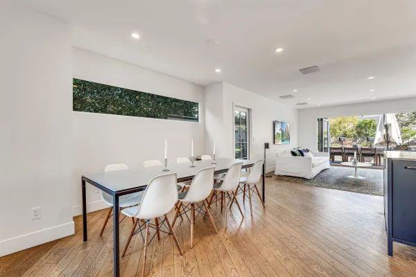 a bedroom with a bed and a rug