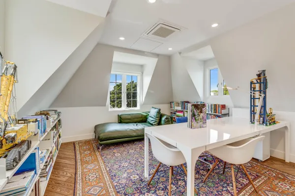 a bathroom with a toilet a sink and a mirror