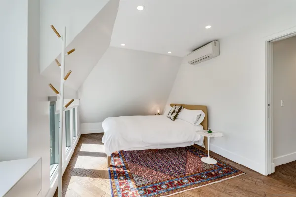 a view of a patio with table and chairs and potted plants