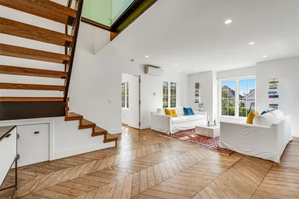 a living room with furniture and a couch