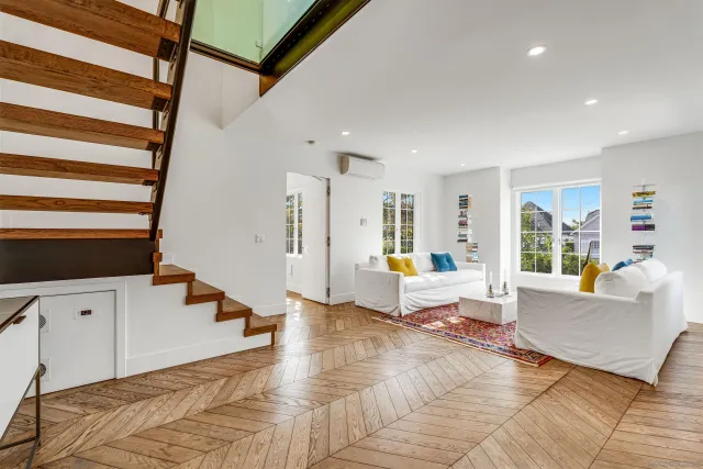 a living room with furniture and a couch
