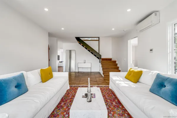 a kitchen with a sink stainless steel appliances and cabinets