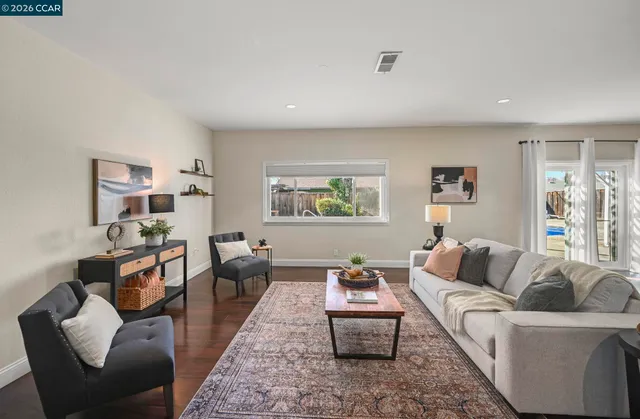 a living room with furniture and a couch