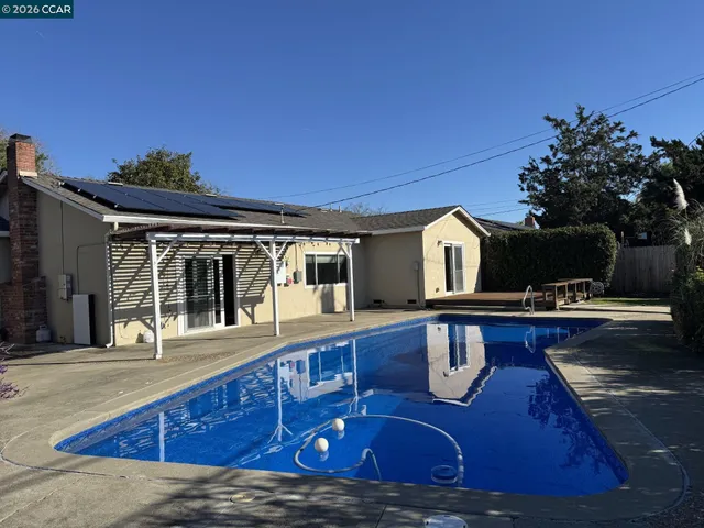 a view of a house with roof deck