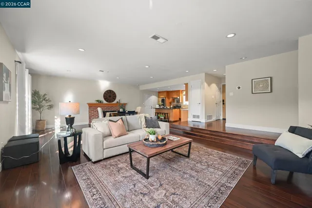a living room with furniture and rug