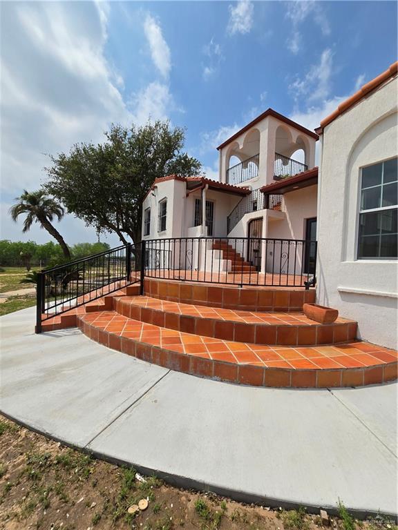6963 North Doffing Road Mission, TX 78574 - Photo 1 of 1 View of front of property featuring stucco siding