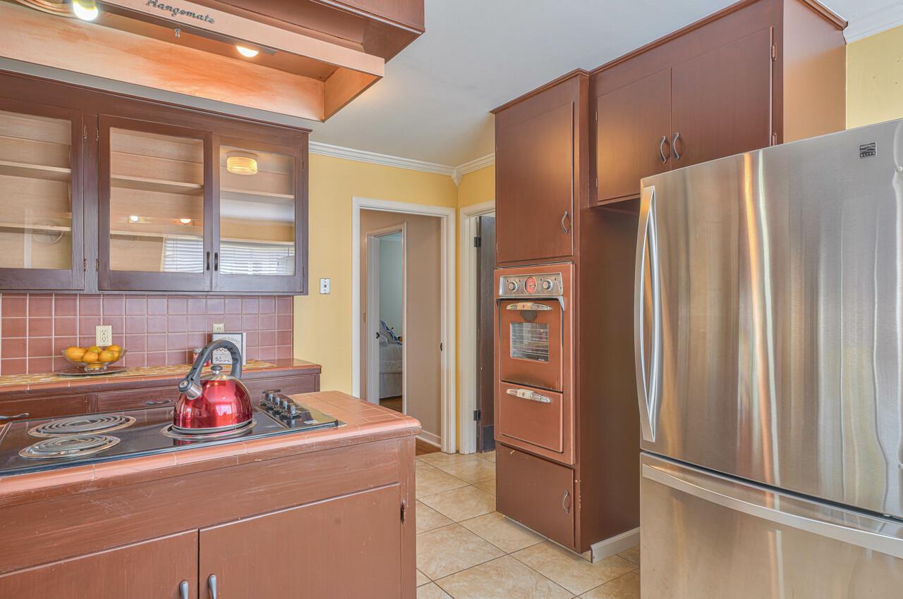 918 Junipero Way Salinas, CA 93901 - Photo 15 of 33 a kitchen with a refrigerator and a sink