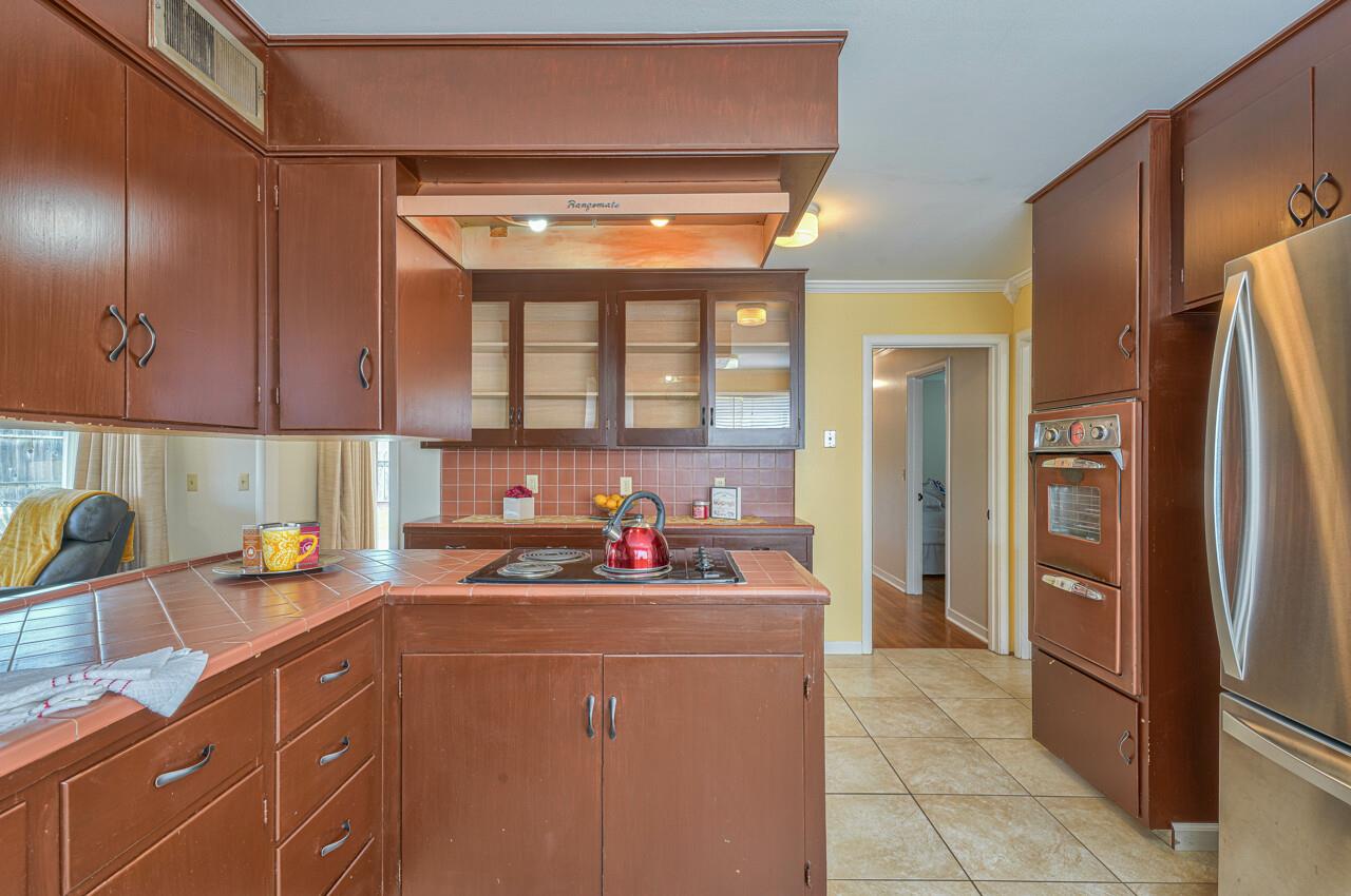 918 Junipero Way Salinas, CA 93901 - Photo 16 of 33 a kitchen with a sink cabinets and refrigerator