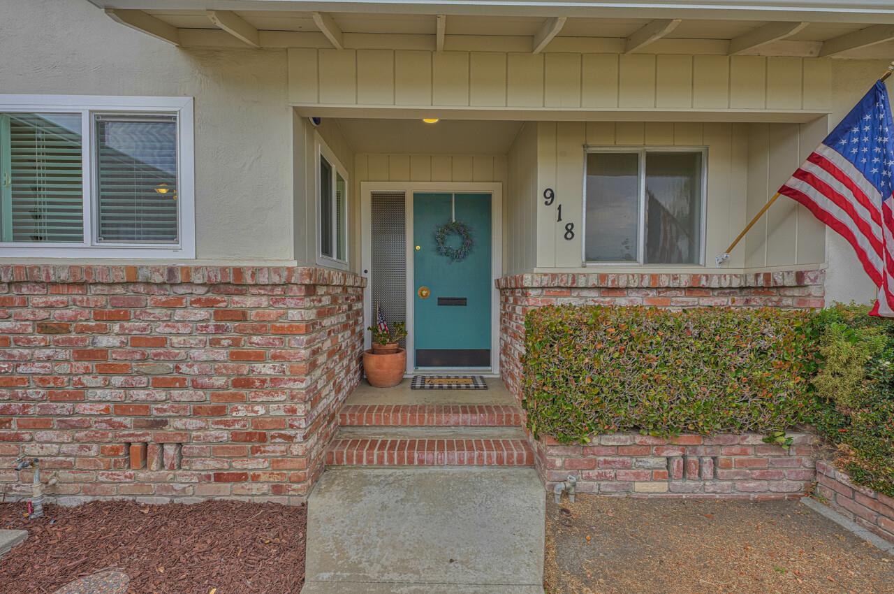 918 Junipero Way Salinas, CA 93901 - Photo 2 of 33 a front view of a house with a garden