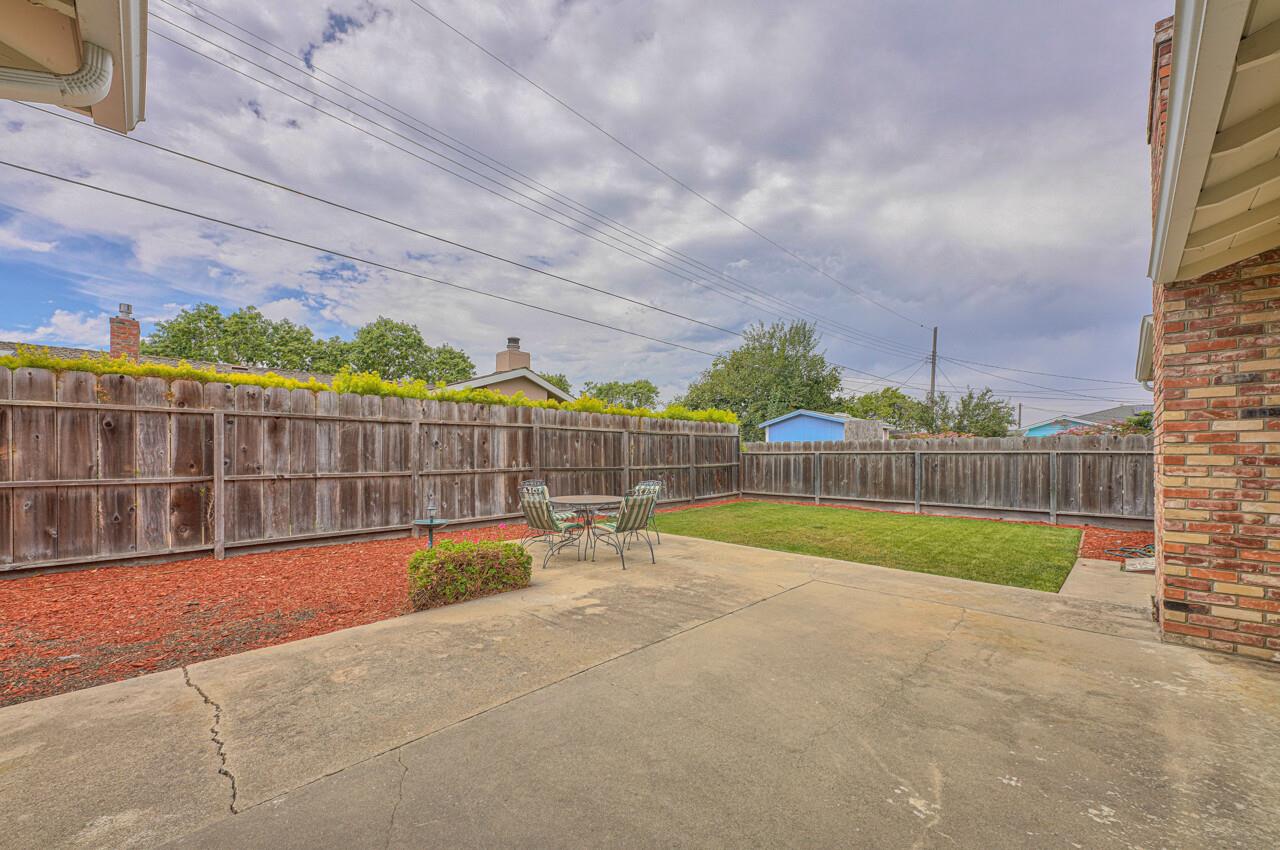 918 Junipero Way Salinas, CA 93901 - Photo 31 of 33 a view of swimming pool with a patio and a yard