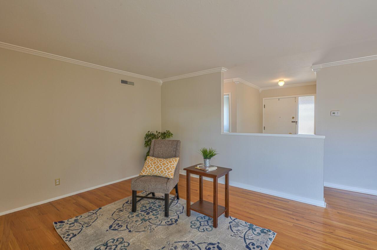 918 Junipero Way Salinas, CA 93901 - Photo 5 of 33 a workspace with furniture and wooden floor