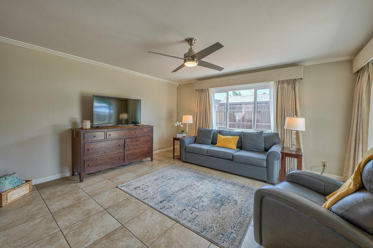 918 Junipero Way Salinas, CA 93901 - Photo 10 of 33 a living room with furniture and a flat screen tv
