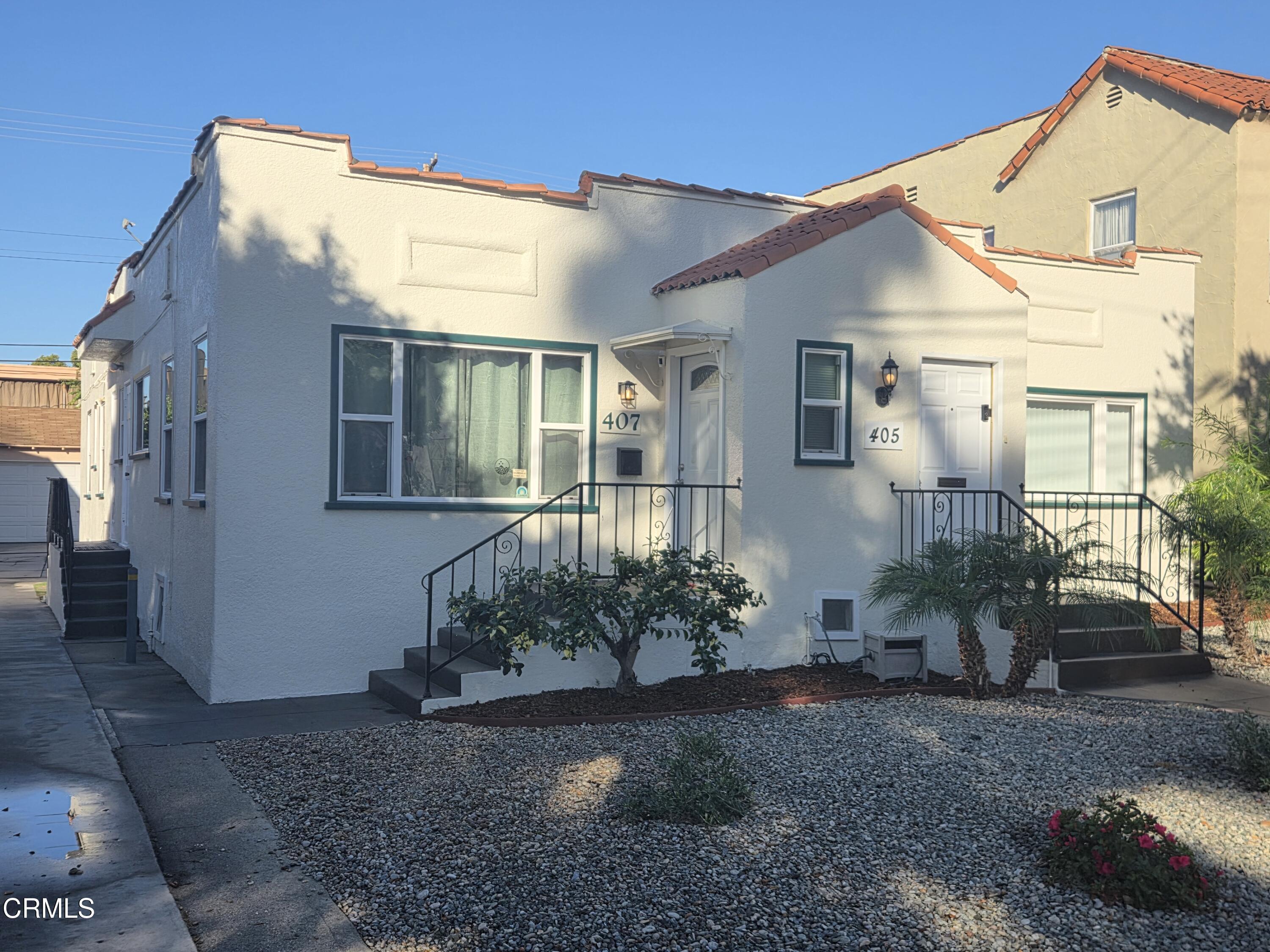 407 South Verdugo Road Glendale, CA 91205 - Photo 2 of 14 a view of a house with a yard