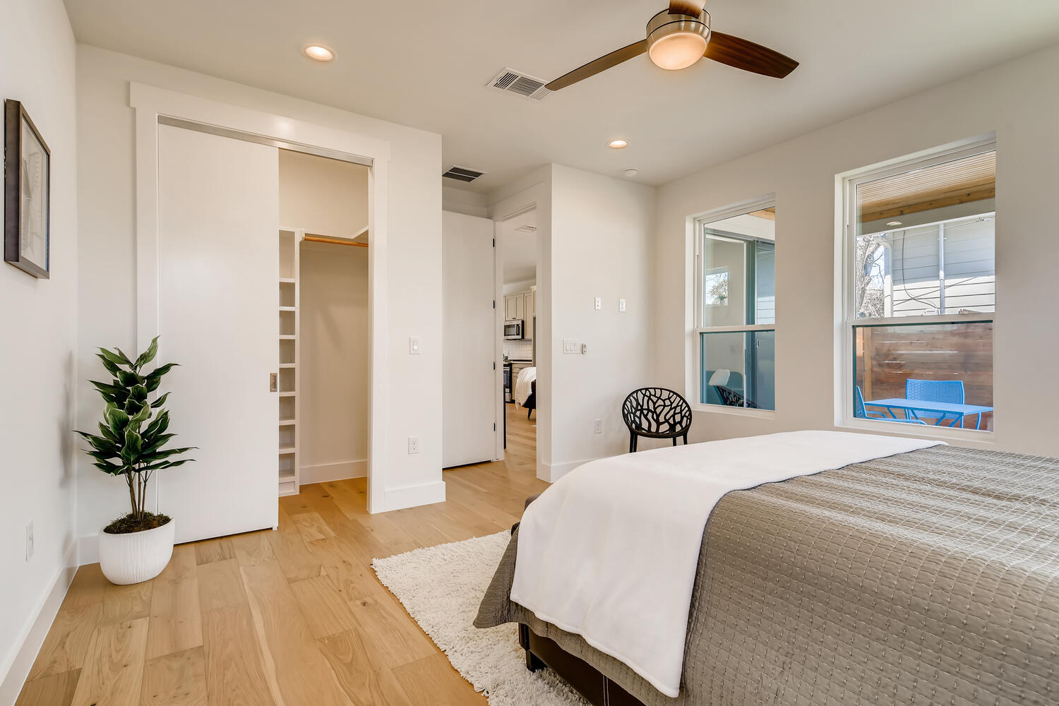 505 Kemp Street Austin, TX 78741 - Photo 16 of 34 The primary suite features its own ensuite and walk-in closet.