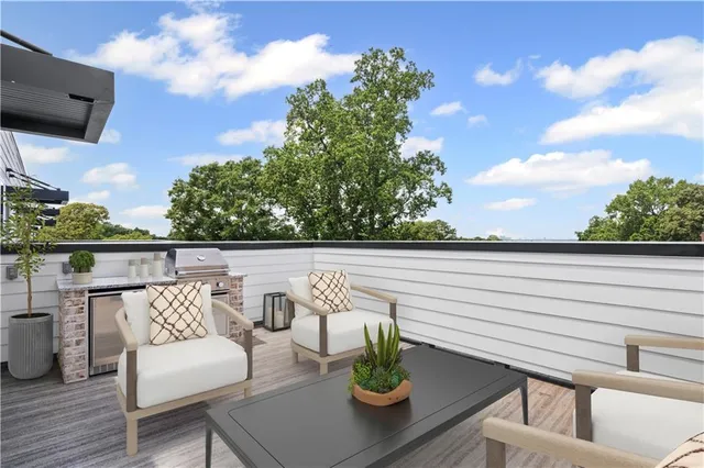 a view of a terrace with seating space