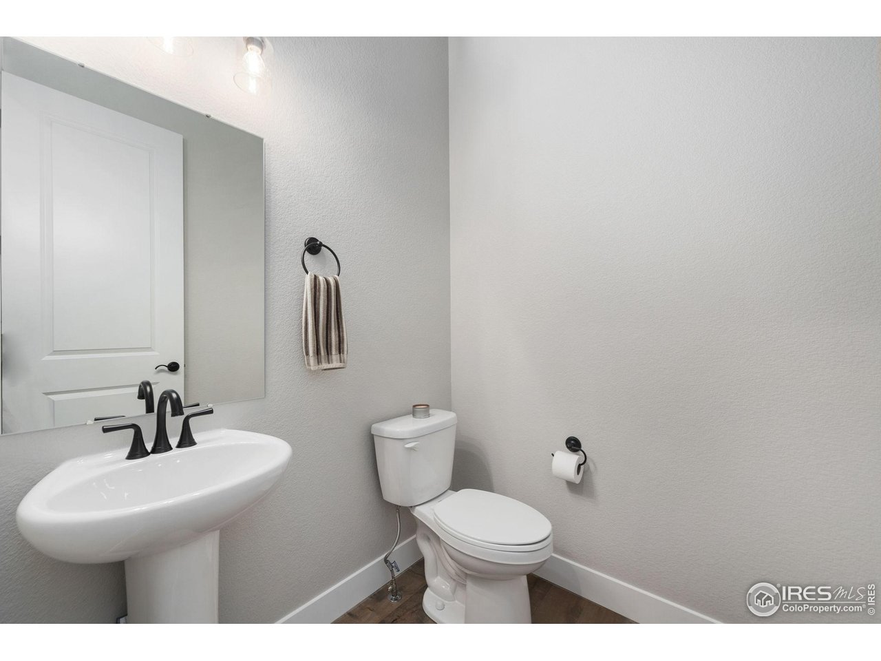 2748 Prairie Flax Street Berthoud, CO 80513 - Photo 14 of 40 Powder Bathroom