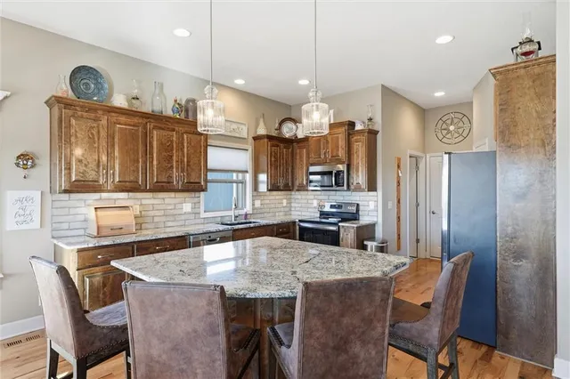 $440,000 | 804 South Washington Street, Raymore, MO 64083