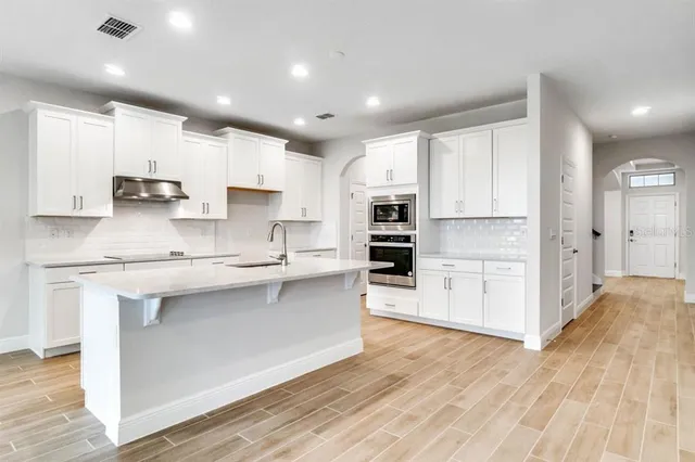 $804,141 | 11229 Hollow Bay Drive, Winter Garden, FL 34787