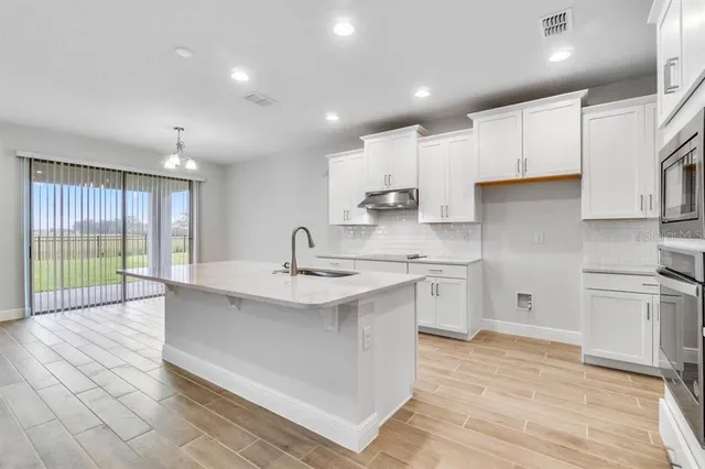 $804,141 | 11229 Hollow Bay Drive, Winter Garden, FL 34787