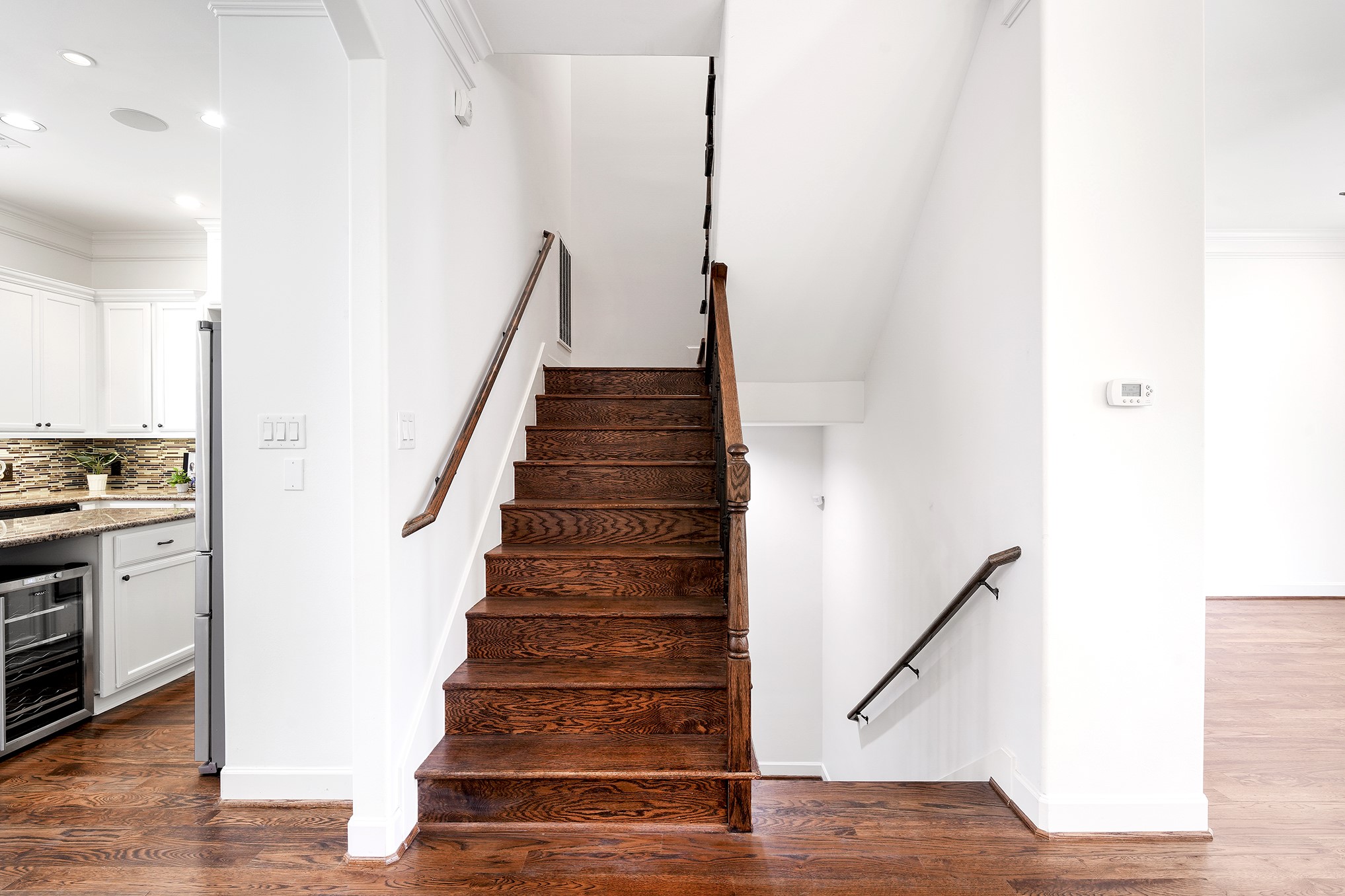 612 West 27th Street Houston, TX 77008 - Photo 25 of 36 a view of entryway and hall with wooden floor