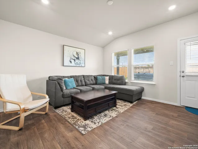 a living room with couches and a coffee table