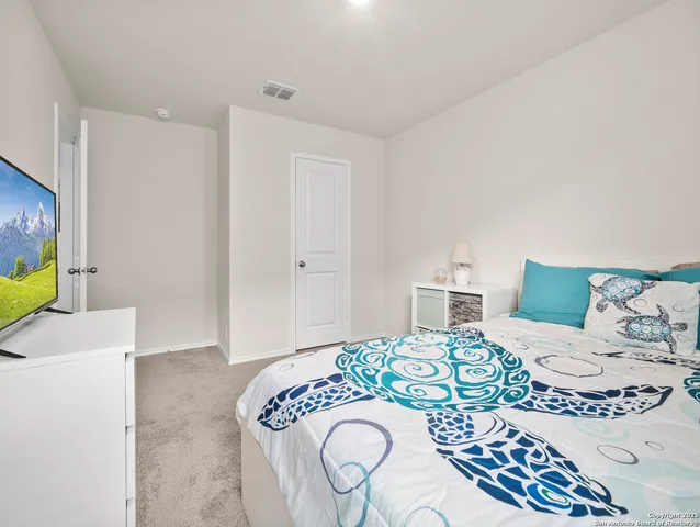 a living room with a couch and a table