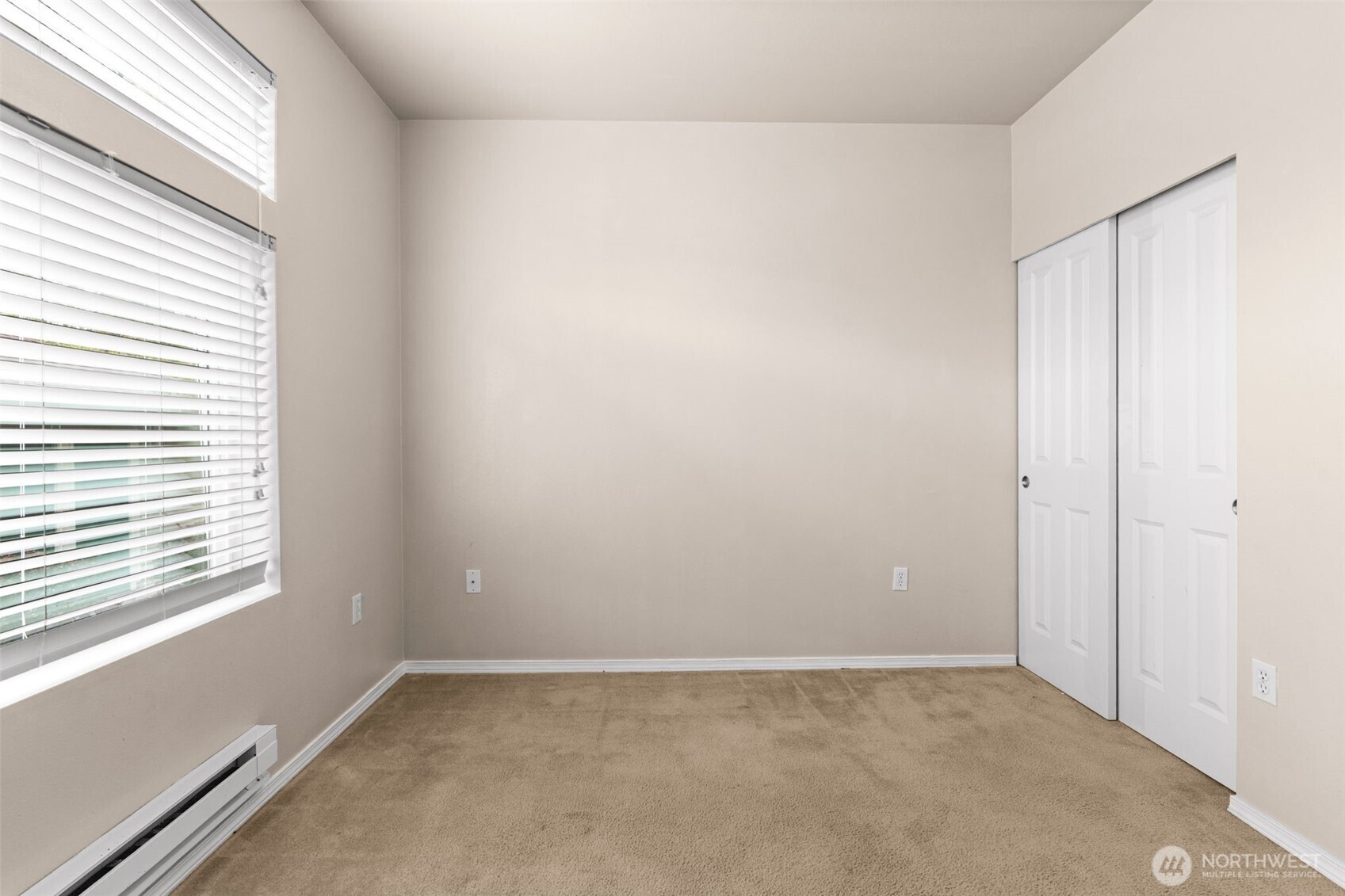6137 Hazel Loop Southeast, Unit A8 Auburn, WA 98092 - Photo 18 of 40 an empty room with windows