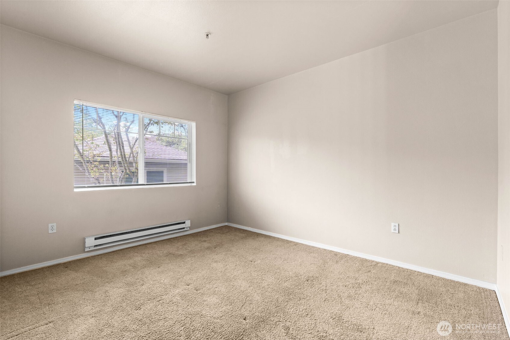 6137 Hazel Loop Southeast, Unit A8 Auburn, WA 98092 - Photo 20 of 40 an empty room with windows
