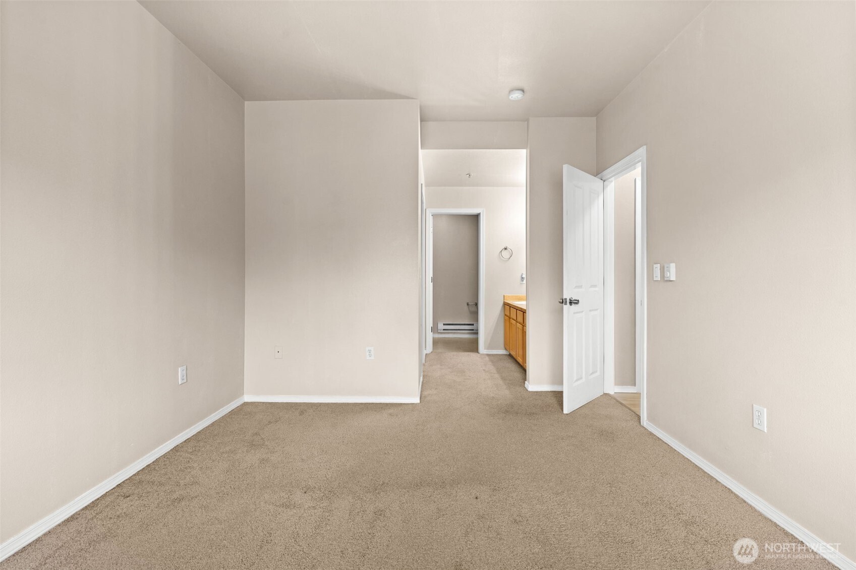 6137 Hazel Loop Southeast, Unit A8 Auburn, WA 98092 - Photo 22 of 40 a view of a room with an empty space
