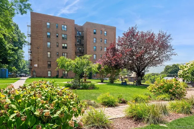 a view of a building with garden