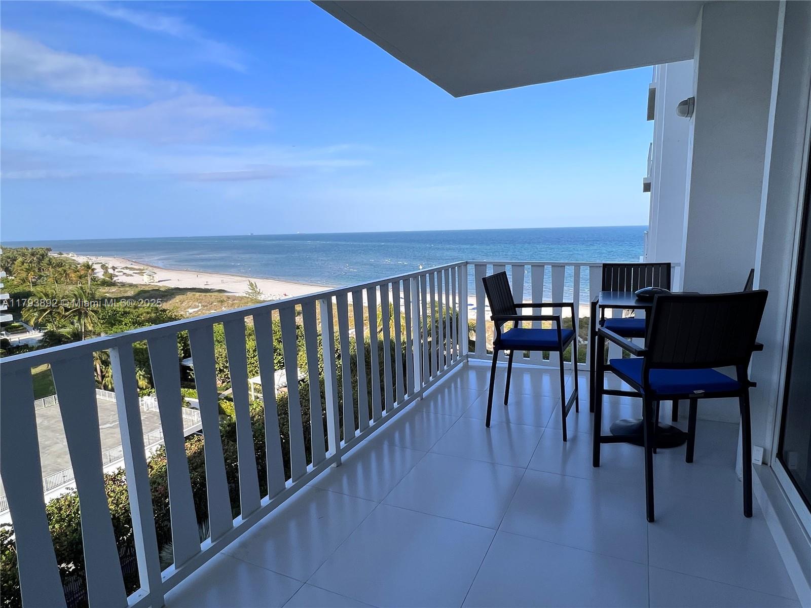 200 Ocean Ln Drive, Unit 803 Key Biscayne, FL 33149 - Photo 20 of 21 a view of balcony with furniture