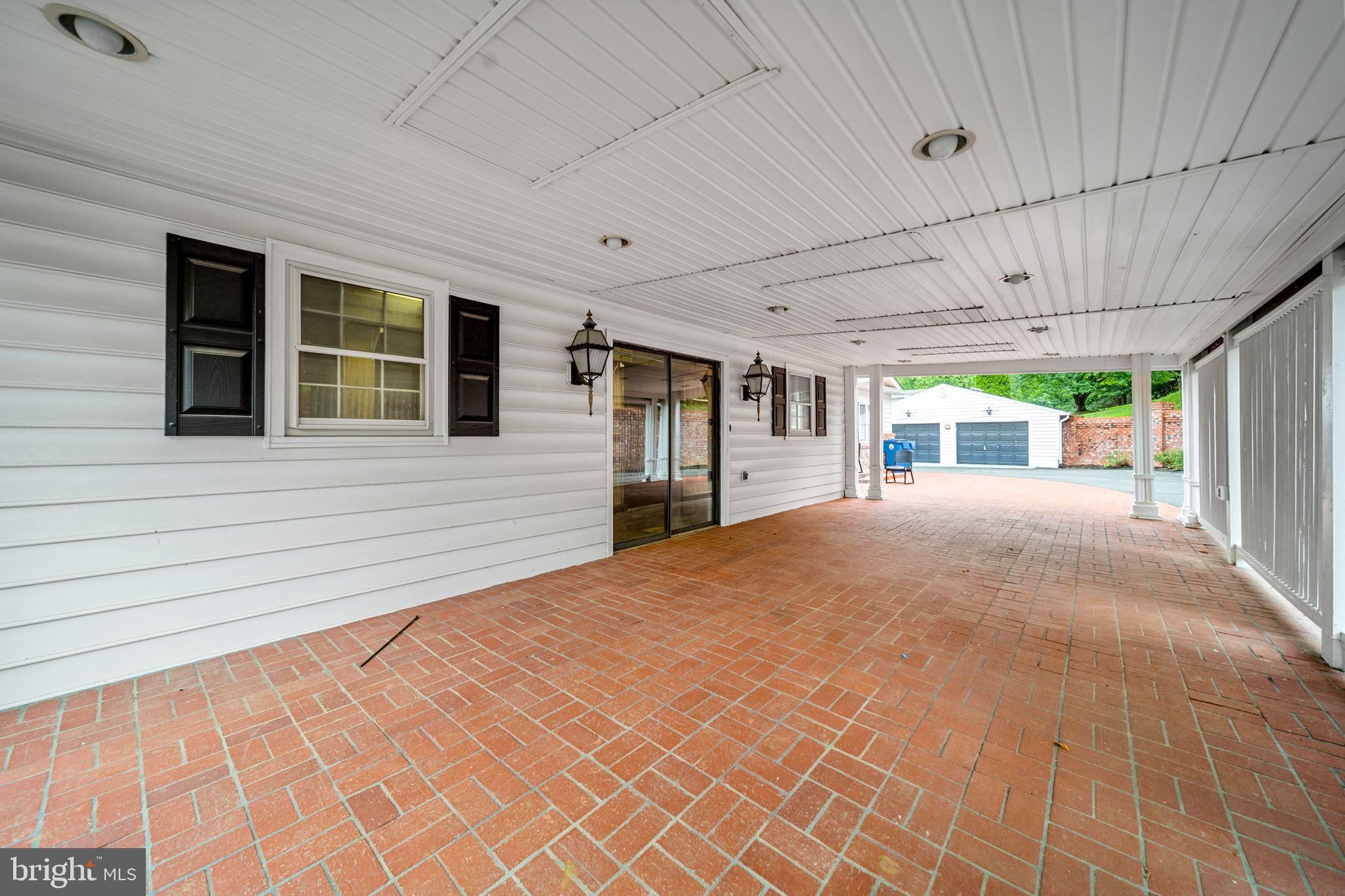 18189 Sands Road Purcellville, VA 20132 - Photo 77 of 145 Carport deck with entrance to breezeway.