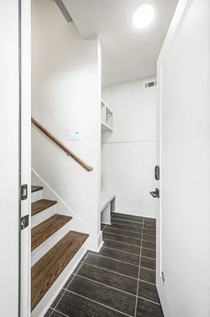 a view of an entryway with staircase