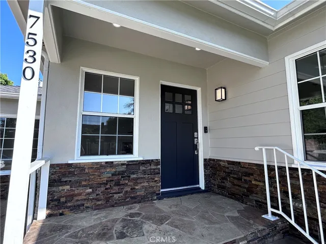 a view of livingroom with hardwood floor and hallway