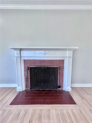 a kitchen with a stove a sink and a refrigerator