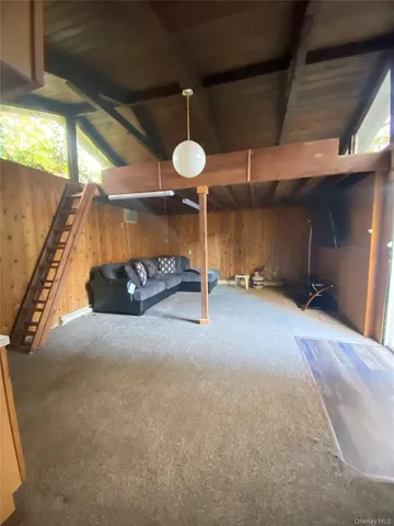 a bed room with a bed and a window