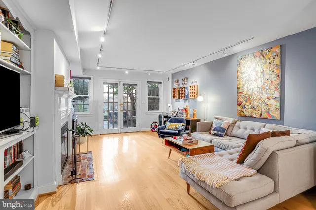 a bedroom with furniture and window
