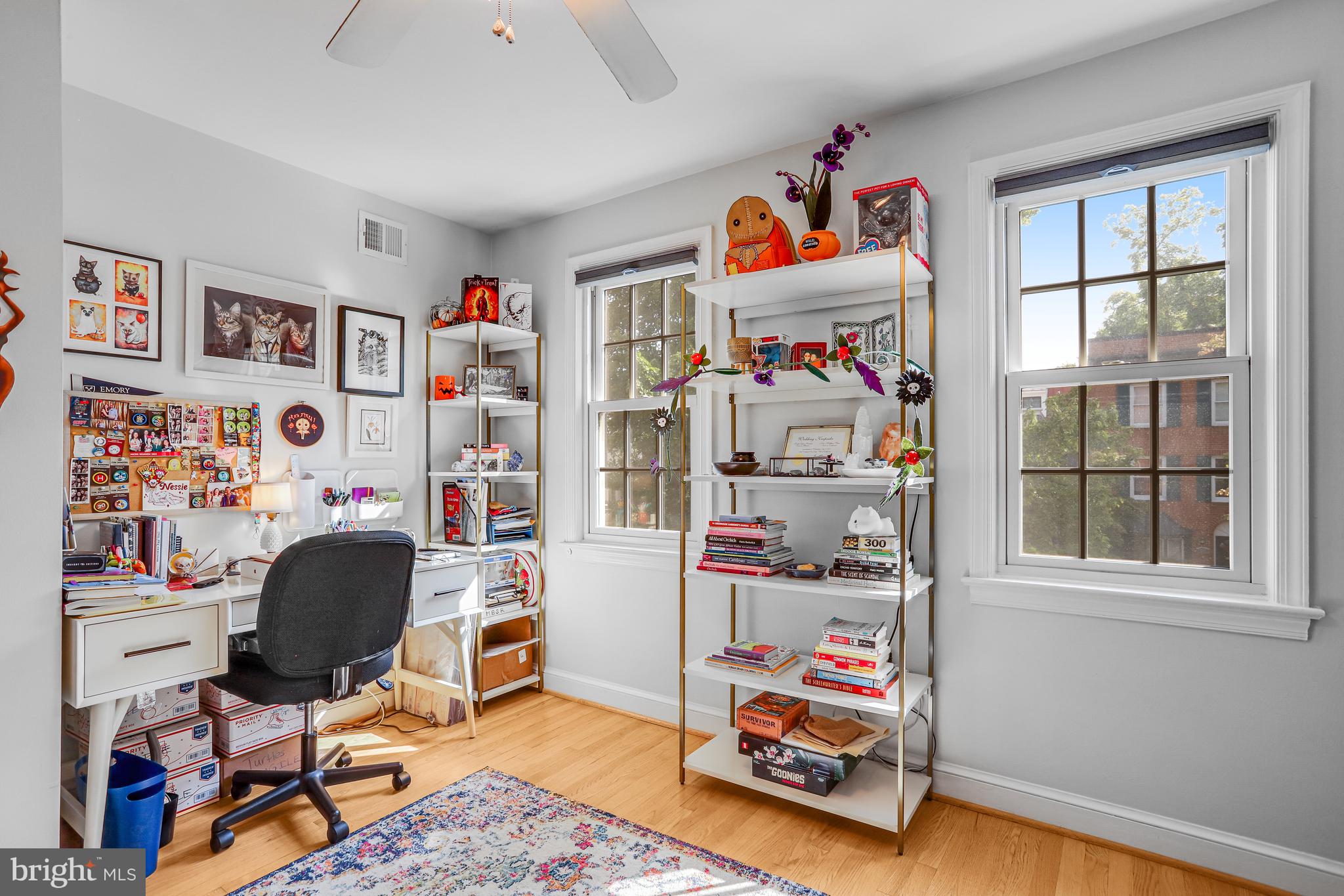 213 9th Street Southeast Washington, DC 20003 - Photo 44 of 74 a workspace with furniture and a window