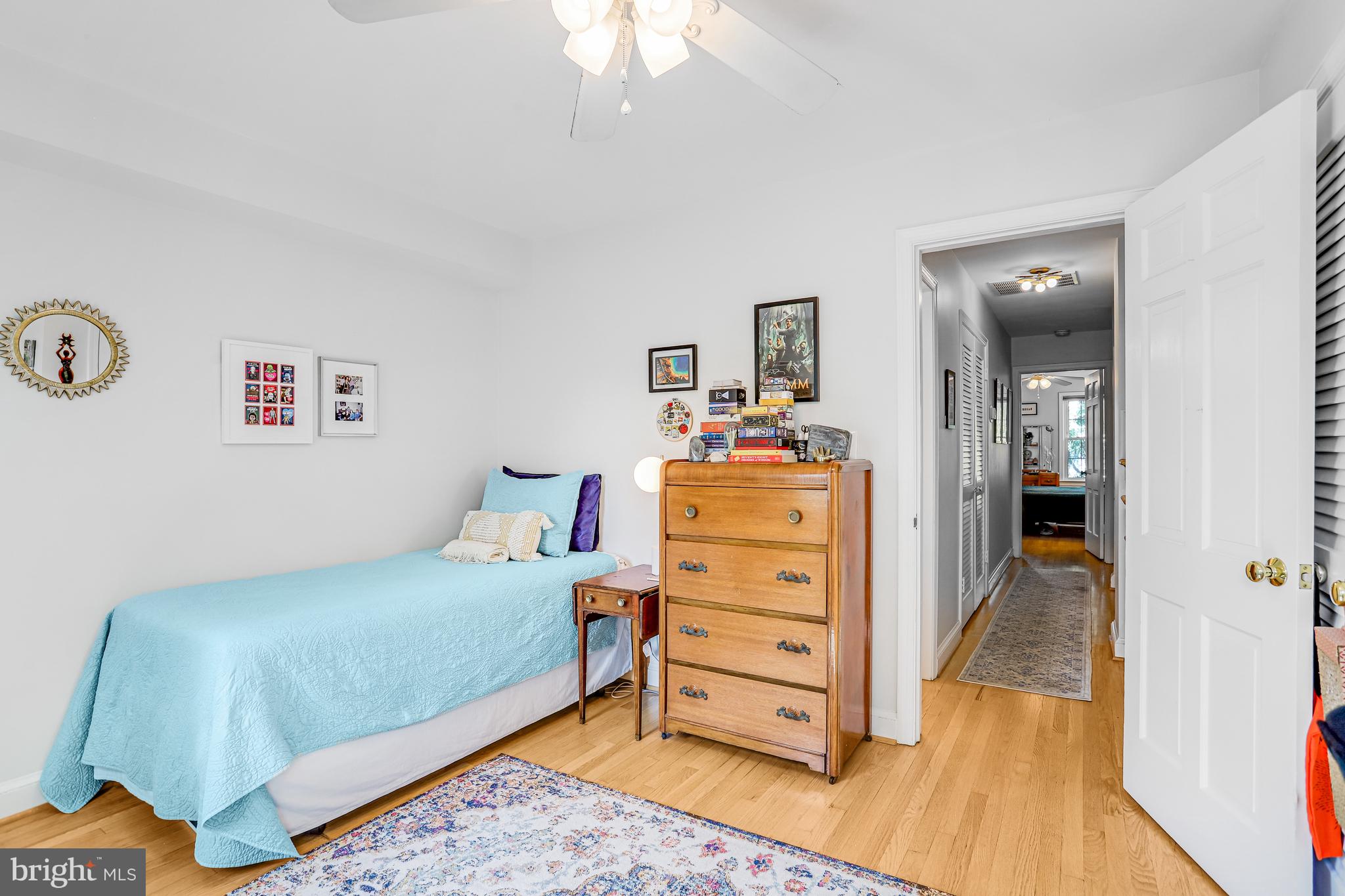 213 9th Street Southeast Washington, DC 20003 - Photo 46 of 74 a bedroom with a bed and a dresser