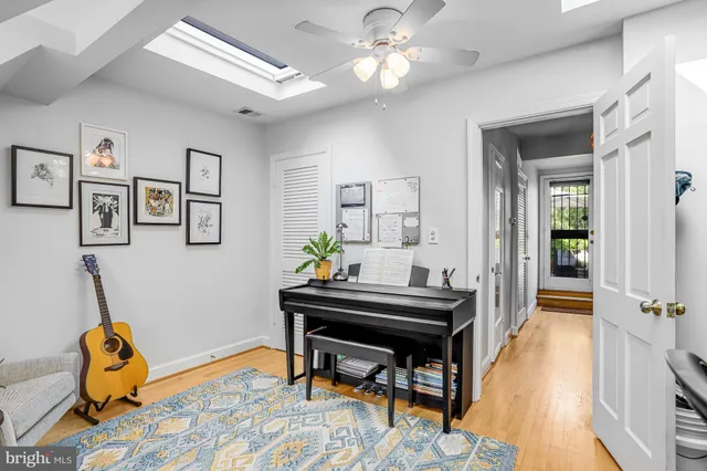 a picture of a bathroom with a shower