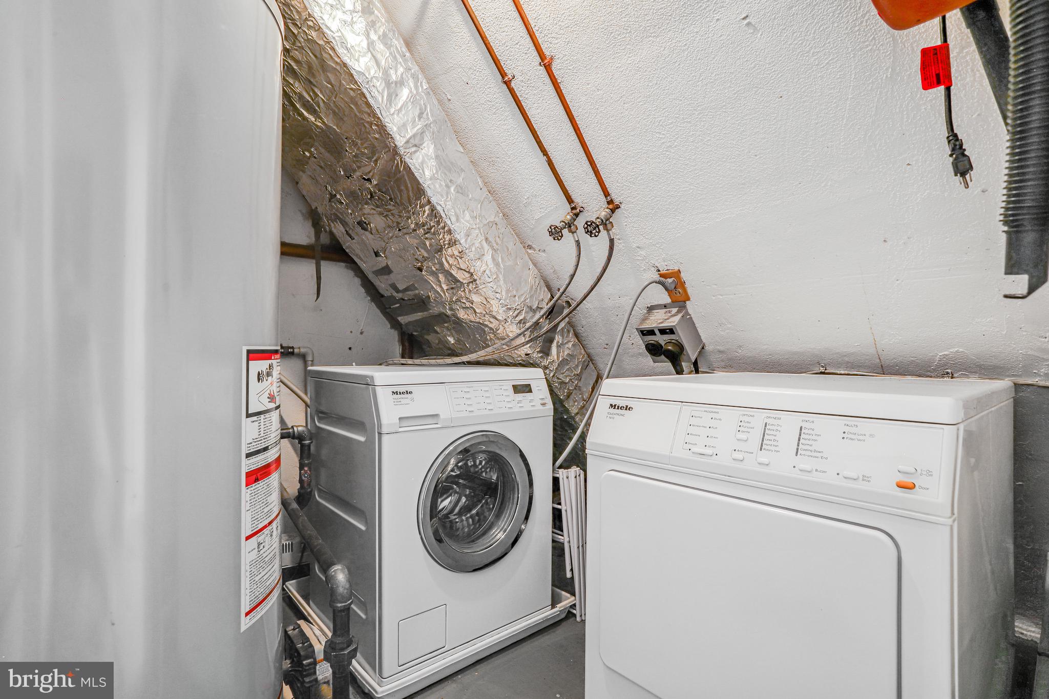 213 9th Street Southeast Washington, DC 20003 - Photo 54 of 74 a utility room with dryer and washer