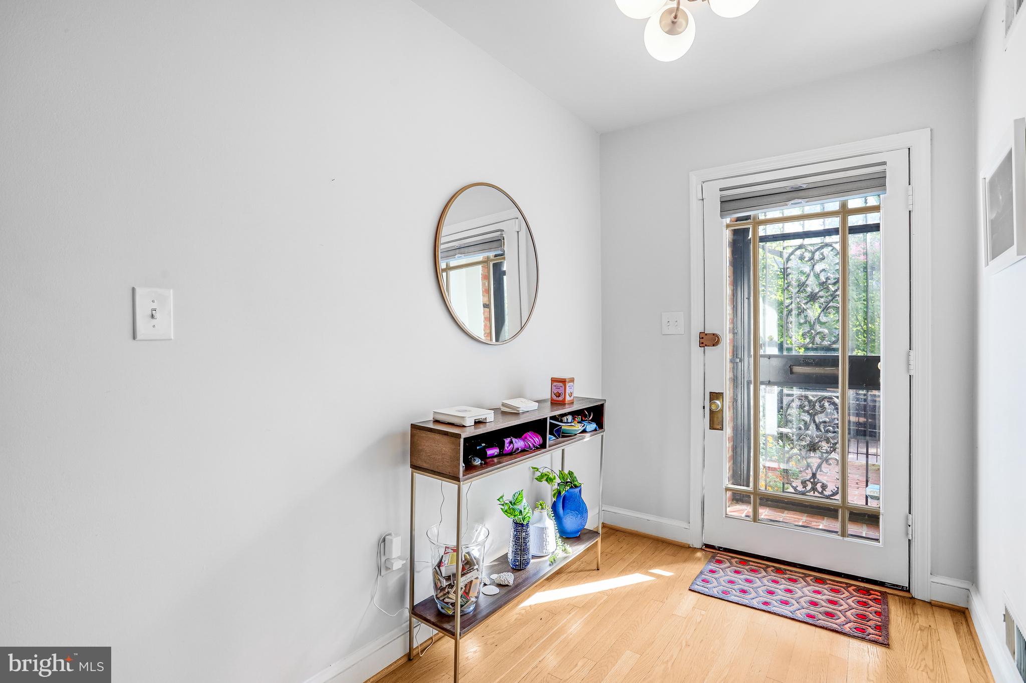 213 9th Street Southeast Washington, DC 20003 - Photo 6 of 74 a view of an entryway with wooden floor