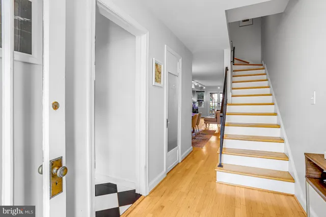 a kitchen with stainless steel appliances granite countertop a stove and a sink