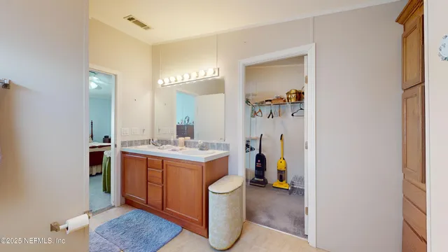 a view of a bathroom sink and a mirror