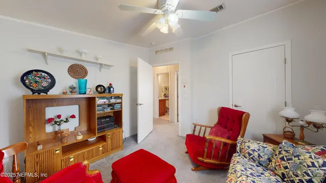 a bedroom with furniture and a bed