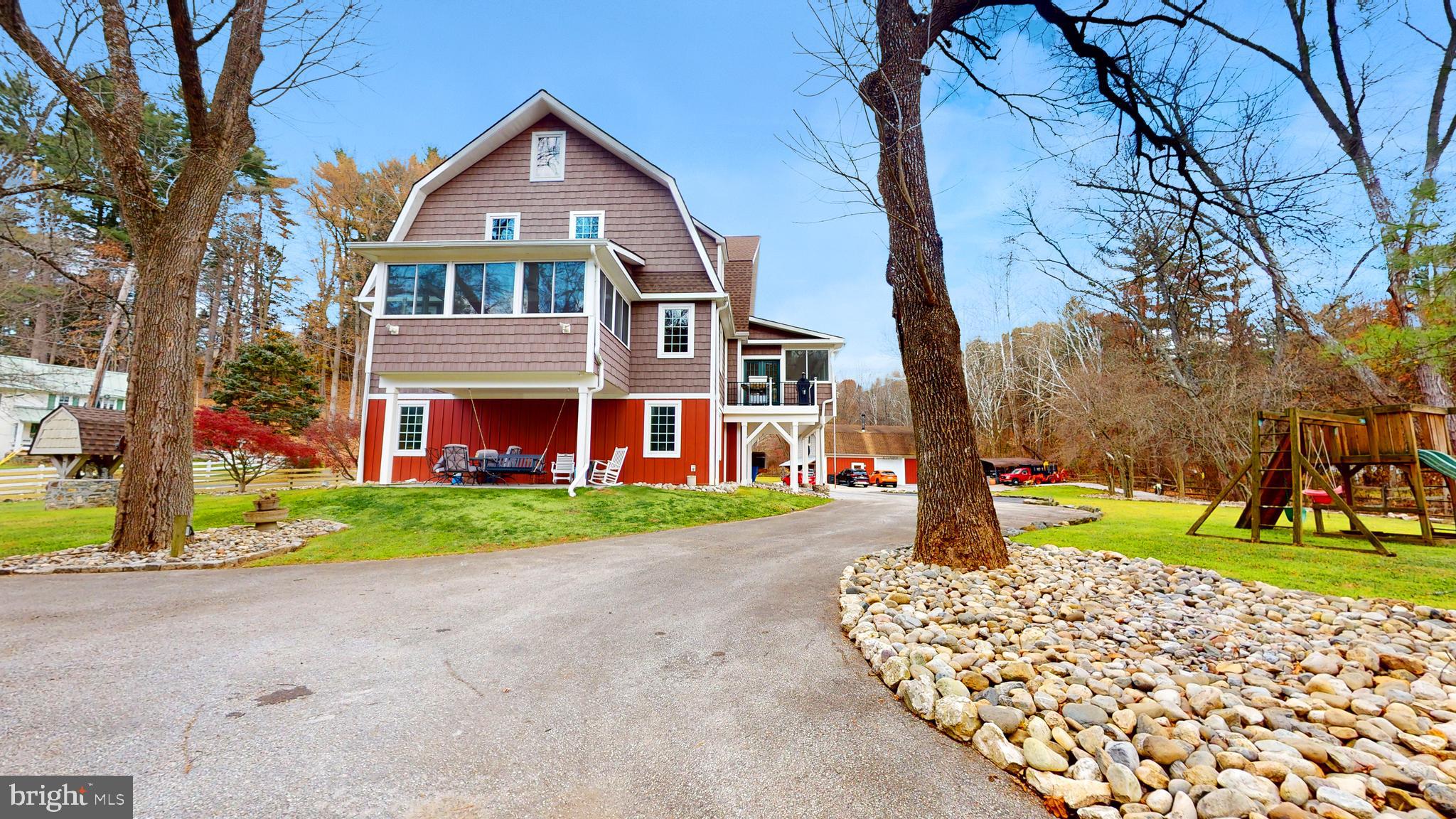 901 Crum Creek Road Springfield, PA 19064 - Photo 109 of 116 a front view of a house with a yard and garage