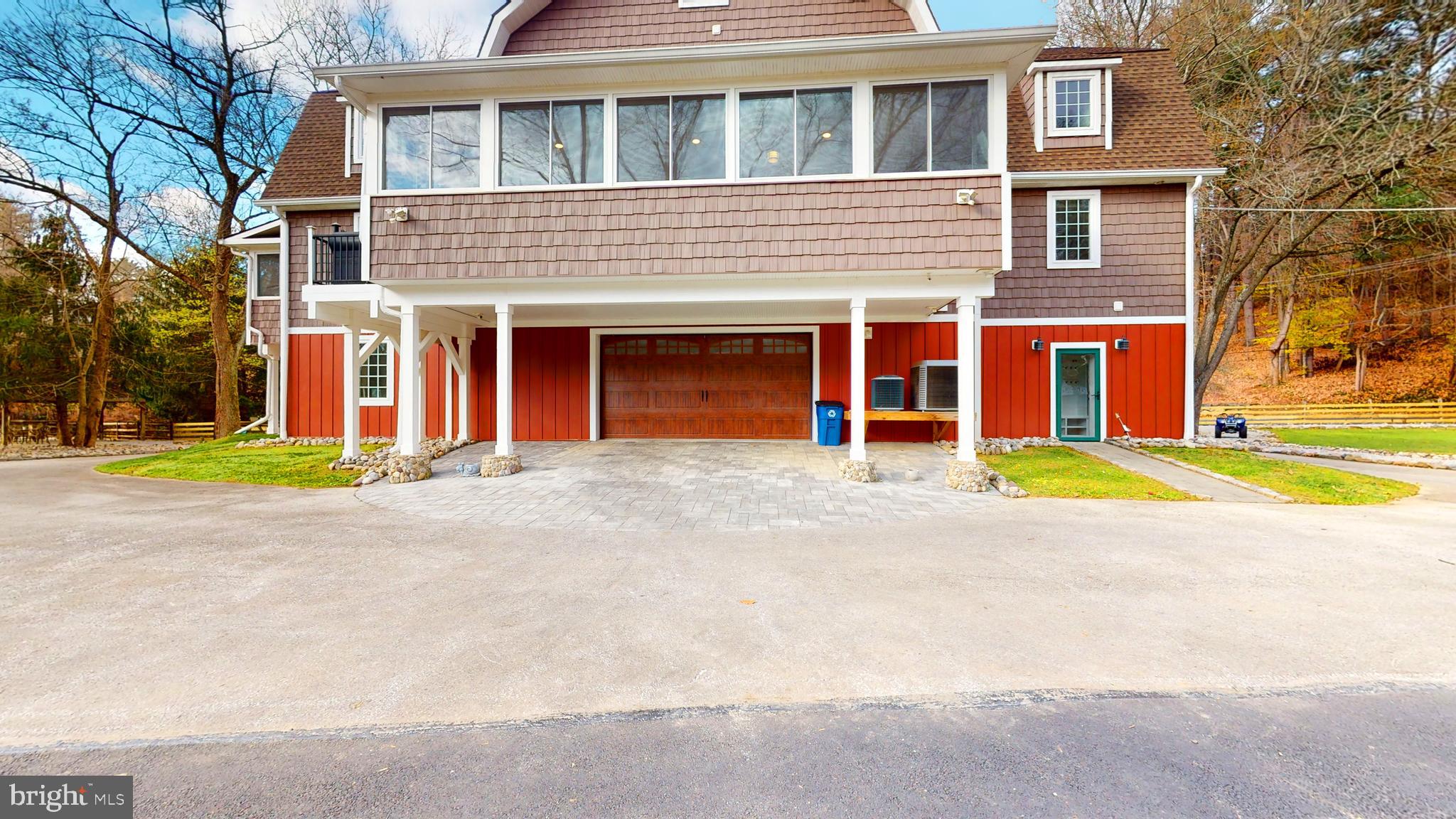 901 Crum Creek Road Springfield, PA 19064 - Photo 112 of 116 a view of a house with a small yard and large tree