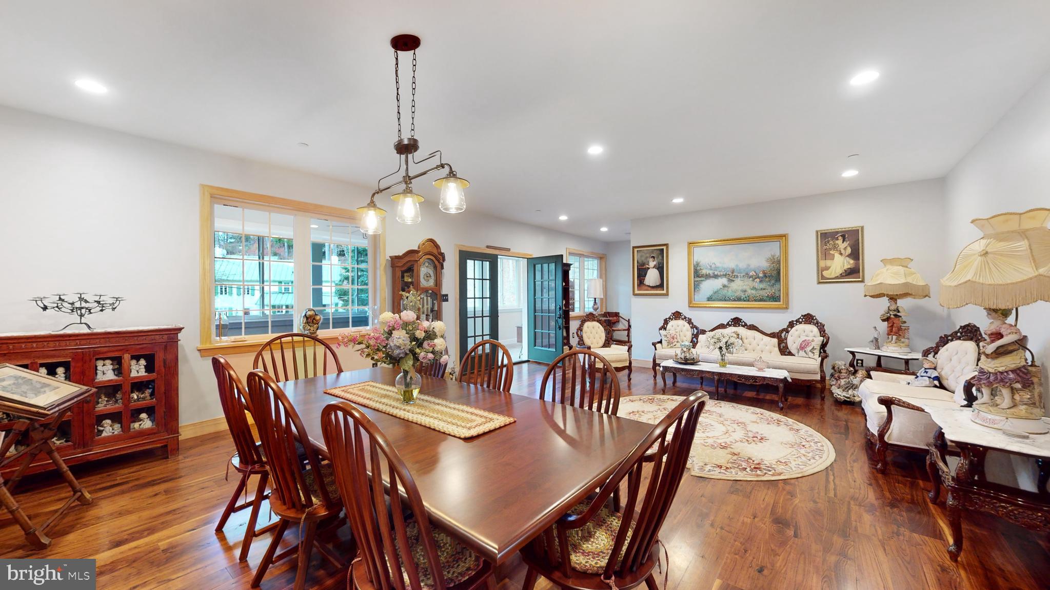 901 Crum Creek Road Springfield, PA 19064 - Photo 14 of 116 a view of a dining room with furniture window and wooden floor