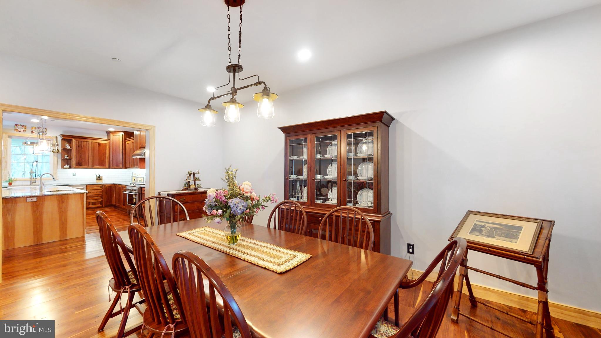 901 Crum Creek Road Springfield, PA 19064 - Photo 16 of 116 a view of a dining room with furniture window and wooden floor